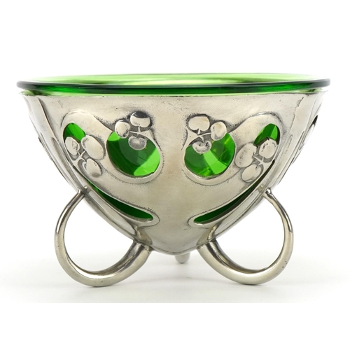 190 - Archibald Knox for Liberty & Co, Arts & Crafts pewter three footed pierced bowl with green glass lin... 