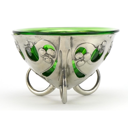 190 - Archibald Knox for Liberty & Co, Arts & Crafts pewter three footed pierced bowl with green glass lin... 