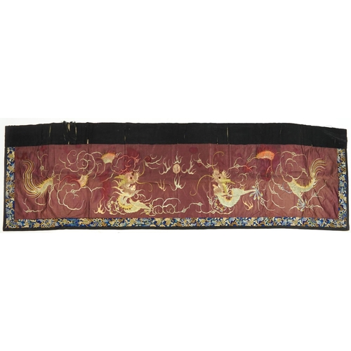 142 - Chinese silk banner finely embroidered with dragons chasing a flaming pearl amongst clouds within a ... 