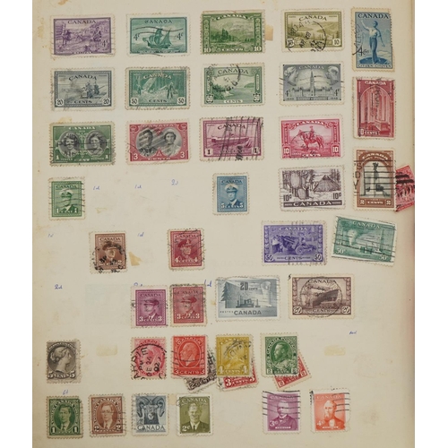 2589 - The Ideal Postage Stamp album with some useful commonwealth and world stamps