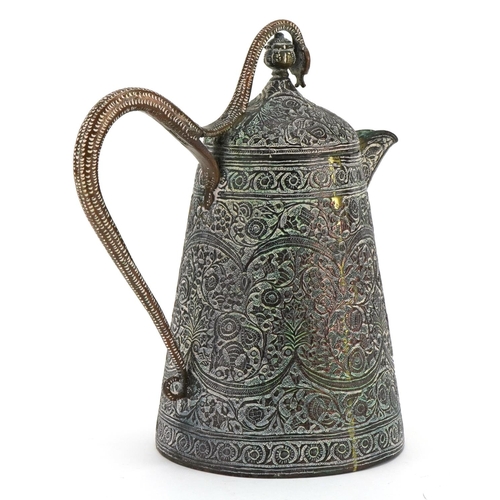 277 - Indian copper jug with serpent handle profusely engraved and decorated in low relief with flowers, 2... 