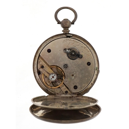 469 - carved Black Forest pocket watch stand housing a white metal pocket watch inscribed London to the du... 