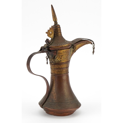 89 - Omani copper and brass dallah coffee pot, 28.5cm high