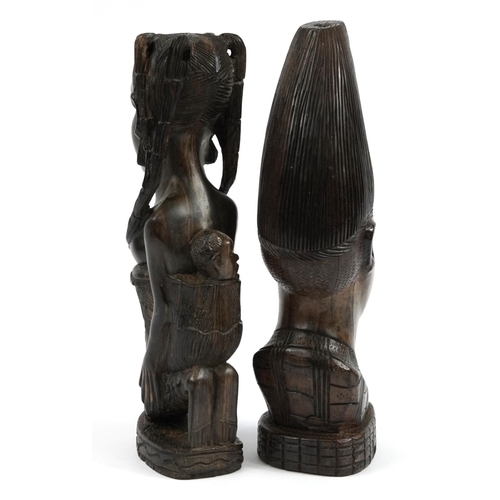 718 - Two African tribal interest ebony carvings including one of a semi nude tribeswoman with baby, 42cm ... 