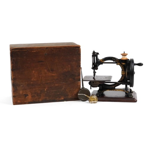 477 - The Shakespear, Victorian The Shakespear cast iron  hand operated sewing machine with gilt decoratio... 