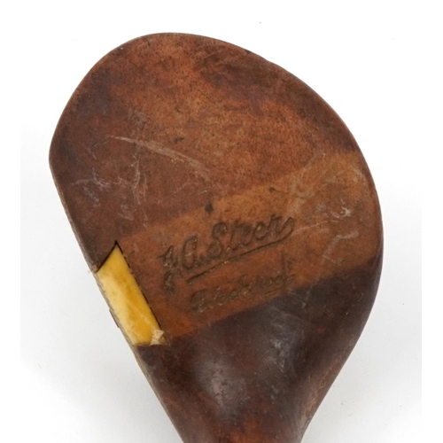 673 - Seven early 20th century wooden and metal shafted golf clubs including irons, some stamped Condie, R... 