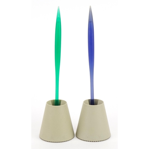 381 - Philippe Starck for Fluocaril, two 1980s  toothbrushes with holders, each overall 20.5cm high