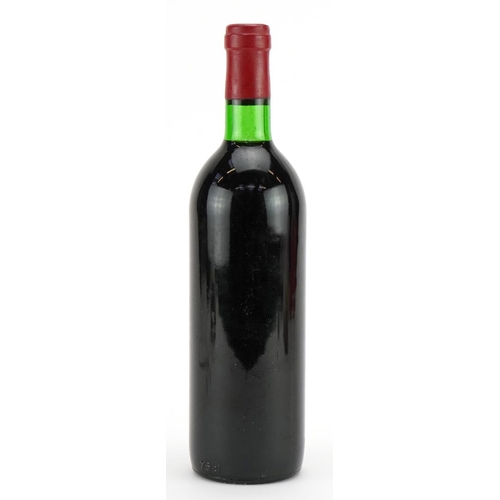 11 - Bottle of 1975 Chateau Haut-Coteau Saint Estephe red wine