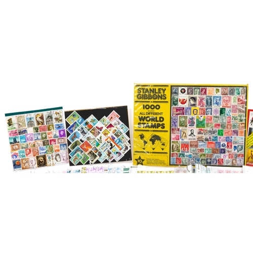 2581 - Collection of world stamps, some loose, some arranged in albums