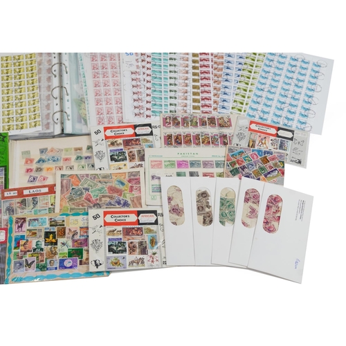 2581 - Collection of world stamps, some loose, some arranged in albums