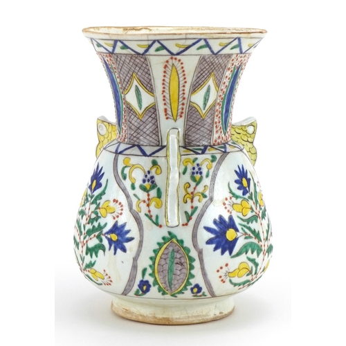 82 - Turkish Kutahya pottery mosque lamp hand painted with stylised flowers, 22cm high