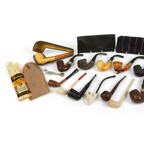 415 - Collection of Meerschaum style smoking pipes including one with carved Maori type bowl and Peterson ... 