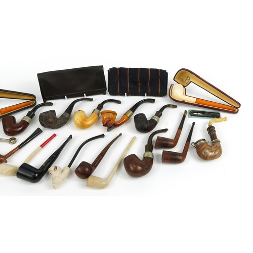 415 - Collection of Meerschaum style smoking pipes including one with carved Maori type bowl and Peterson ... 