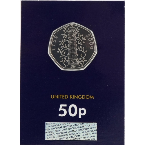 2543 - Elizabeth II Kew Gardens fifty pence piece housed in a Change Checker capsule