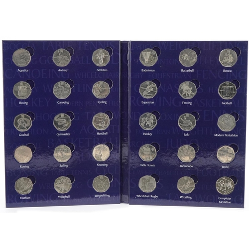 2545 - Full Elizabeth II fifty pence sports album comprising twenty nine fifty pence pieces and a completer... 