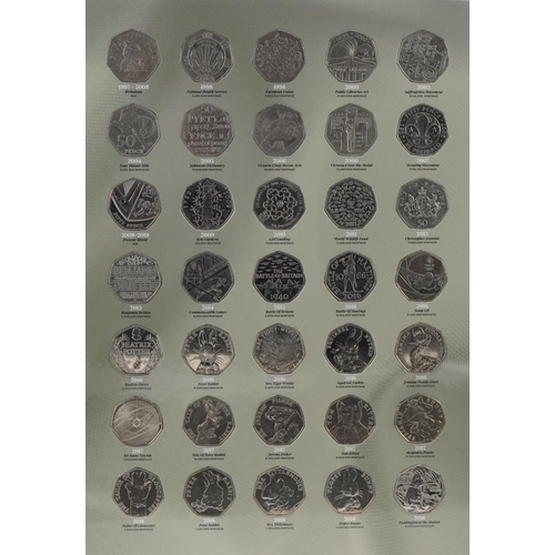 2544 - Elizabeth II Great British fifty pence coin collection housing sixty five fifty pence coins includin... 