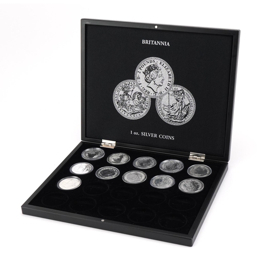 2539 - Eleven Elizabeth II Britannia one ounce fine silver two pound coins arranged in a Britannia silver c... 