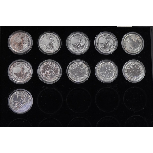 2539 - Eleven Elizabeth II Britannia one ounce fine silver two pound coins arranged in a Britannia silver c... 