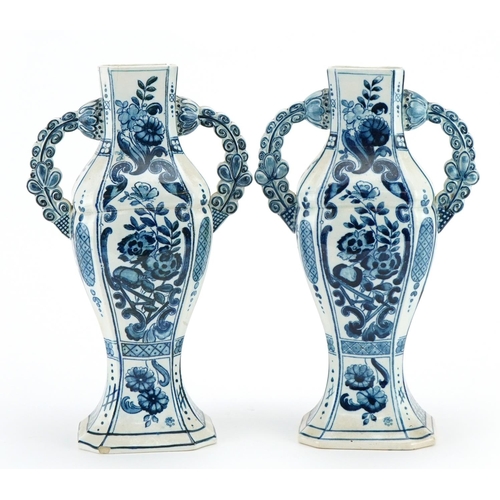 358 - Villeroy & Boch, pair of Dutch Delft tin glazed vases with twin handles hand painted with flowers, e... 