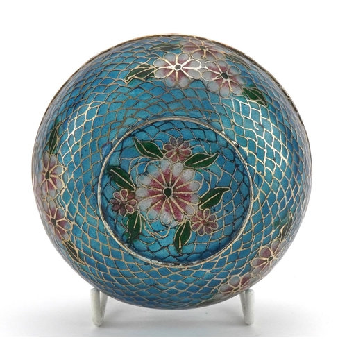 582 - Japanese plique a jour enamel box and cover enamelled with flowers, 10cm in diameter