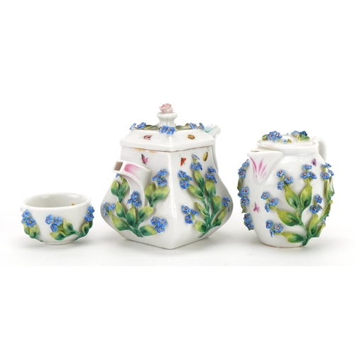 243 - Meissen style continental floral encrusted porcelain comprising teapot, jug and bowl, each hand pain... 