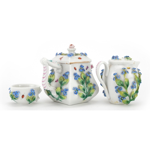 243 - Meissen style continental floral encrusted porcelain comprising teapot, jug and bowl, each hand pain... 