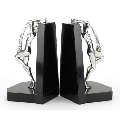 497 - Pair of Art Deco chrome plated and ebonised bookends in the form of nude female dancers, each 21.5cm... 