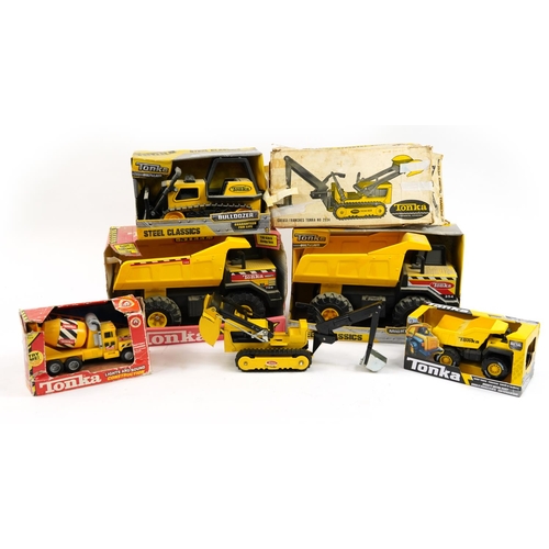 1570 - Six vintage Tonka construction vehicles, some tinplate, the largest 40cm in length