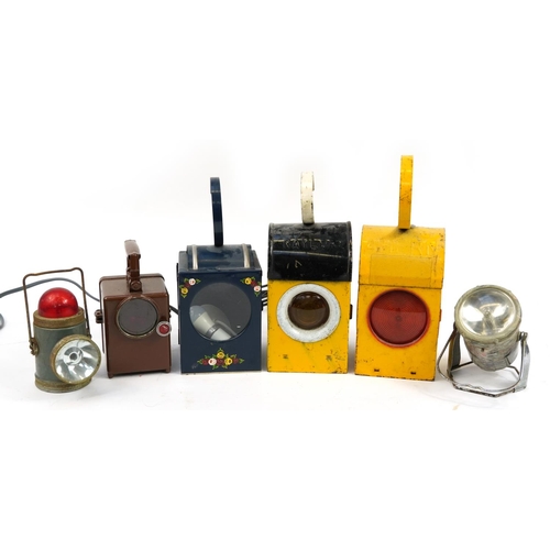 1190 - Six vintage and later railway interest lanterns, some enamelled, the largest 25.5cm high