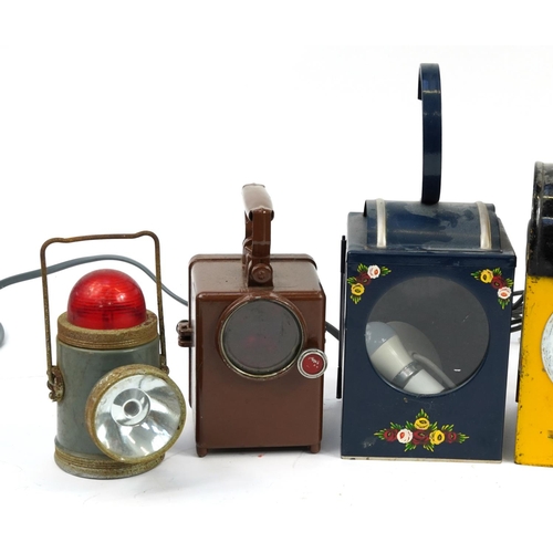 1190 - Six vintage and later railway interest lanterns, some enamelled, the largest 25.5cm high