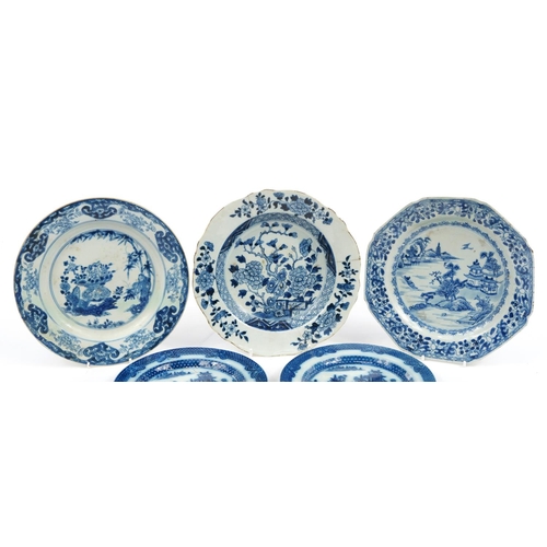 513 - Three Chinese blue and white porcelain plates hand painted with flowers and a river landscape togeth... 