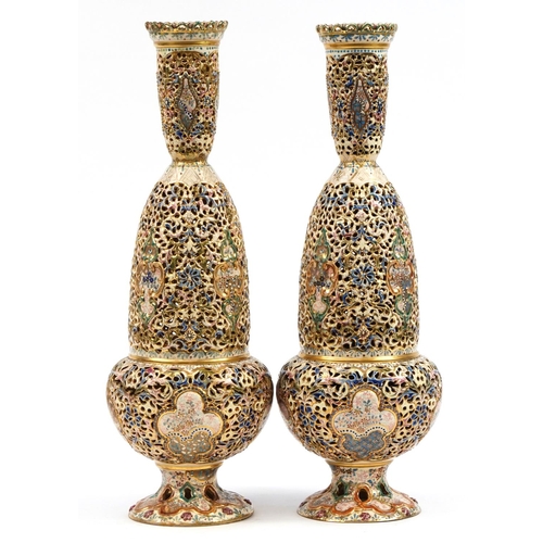 34 - Zsolnay Pecs, large pair of Hungarian reticulated pierced vases hand painted with flowers, each with... 