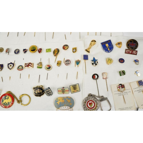 2449 - Large collection of world football club stickpins, lapel pins and badges, some enamel, including Eng... 