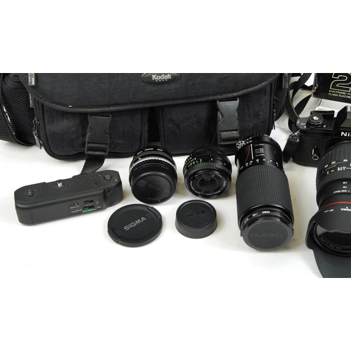 Nikon EM camera with lenses, accessories and carry bag including Sigma