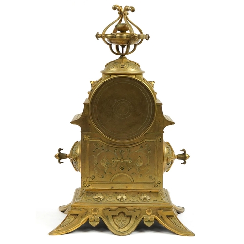 43 - 19th century bronze Gothic style mantle clock striking on a bell, with circular dial having Roman nu... 