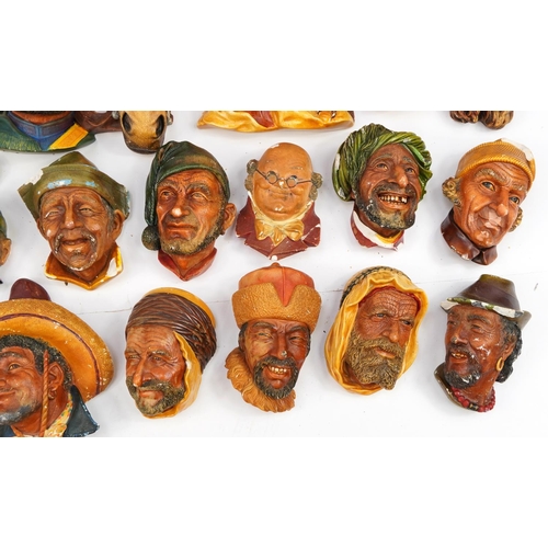 960 - Large collection of Bossons hand painted plaster wall plaques, the largest 20cm in length