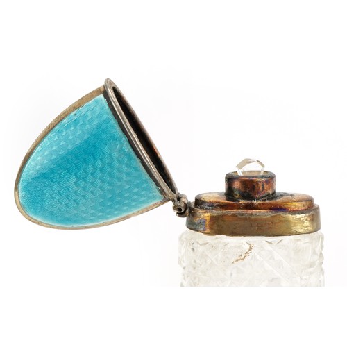 108 - Antique cut glass scent bottle with silver and blue guilloche enamelled hinged lid, indistinct hallm... 