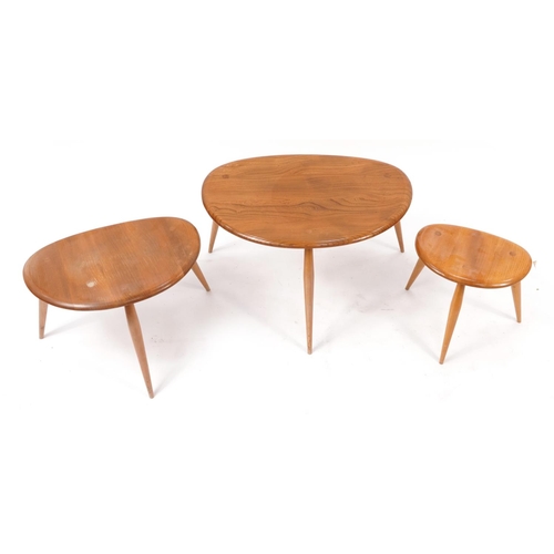 853 - Nest of three Ercol light elm pebble occasional tables, the largest 39cm H x 64.5cm W x 43cm D