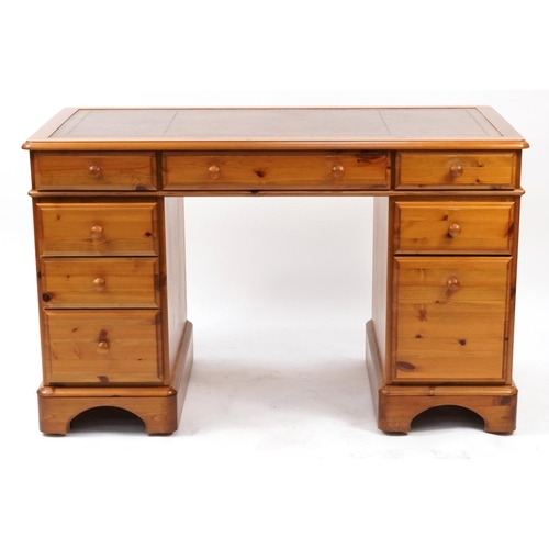 866 - Pine twin pedestal desk with tooled leather insert, 76cm H x 121cm W x 63cm D