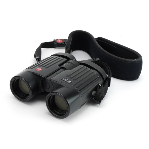 1343 - Pair of Leica Trinovid 8x32 BA binoculars with leather case, 12cm in length
