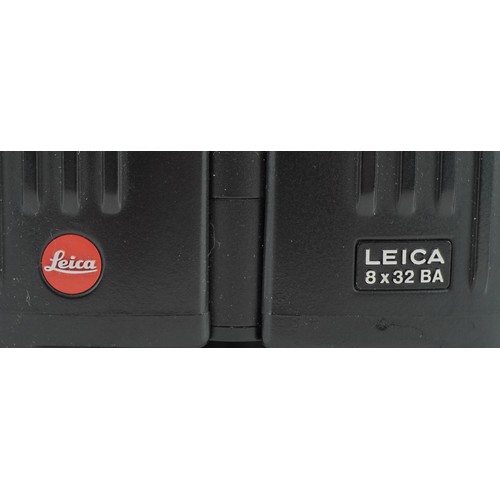1343 - Pair of Leica Trinovid 8x32 BA binoculars with leather case, 12cm in length