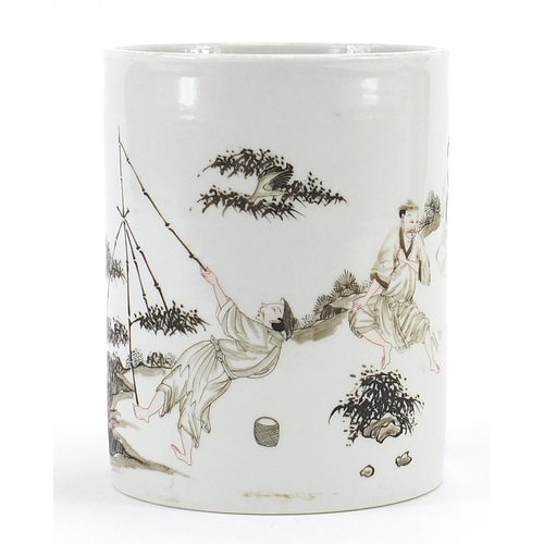 333 - Chinese porcelain en grisaille brush pot hand painted with figures in a landscape, 13.5cm high