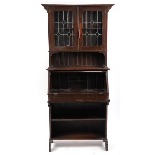 871 - Arts and Crafts oak bureau bookcase with a pair of leaded glass doors, 183cm H x 80cm W x 33cm D