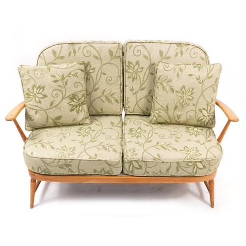 894 - Ercol light elm Windsor two seater settee, 131cm wide