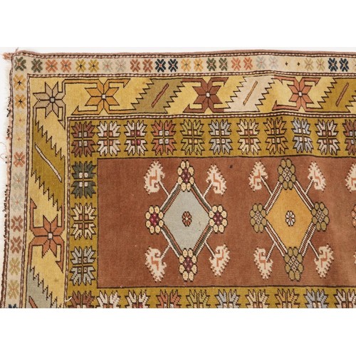 897 - Rectangular beige ground rug with all over geometric design, 200cm x 117