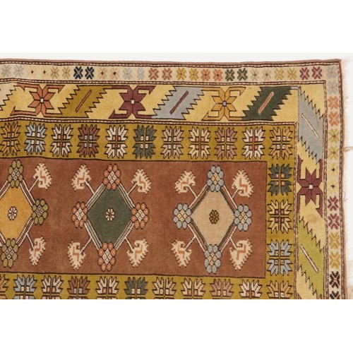 897 - Rectangular beige ground rug with all over geometric design, 200cm x 117