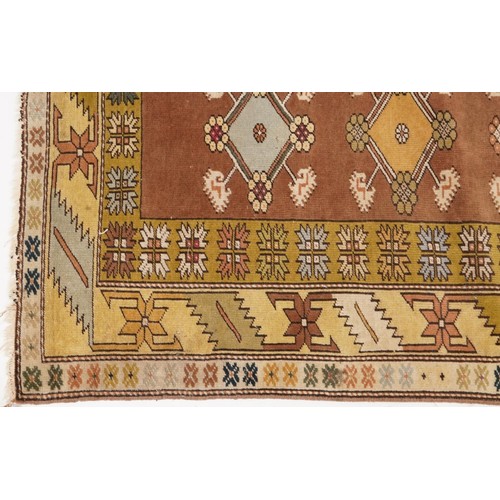 897 - Rectangular beige ground rug with all over geometric design, 200cm x 117