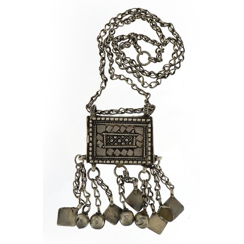 425 - Omani unmarked silver amulet on unmarked silver chain, the amulet 5.5cm wide, total weight 75.6g