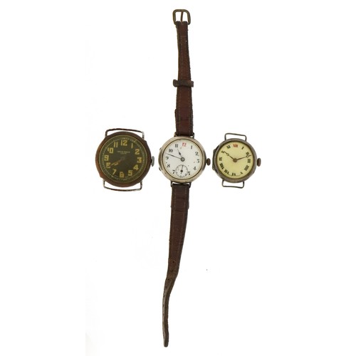 2096 - Three military interest trench watches, two silver with enamel dials, the largest 30mm in diameter