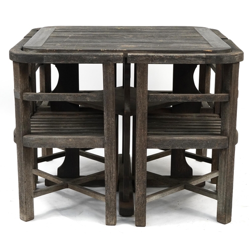 854 - Shipping interest teak garden table and four chairs, made from teak taken from HMS Powerful circa 19... 